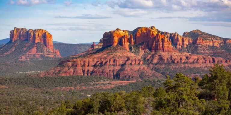 Red rock buttes above green forest near Sedona, Arizona
